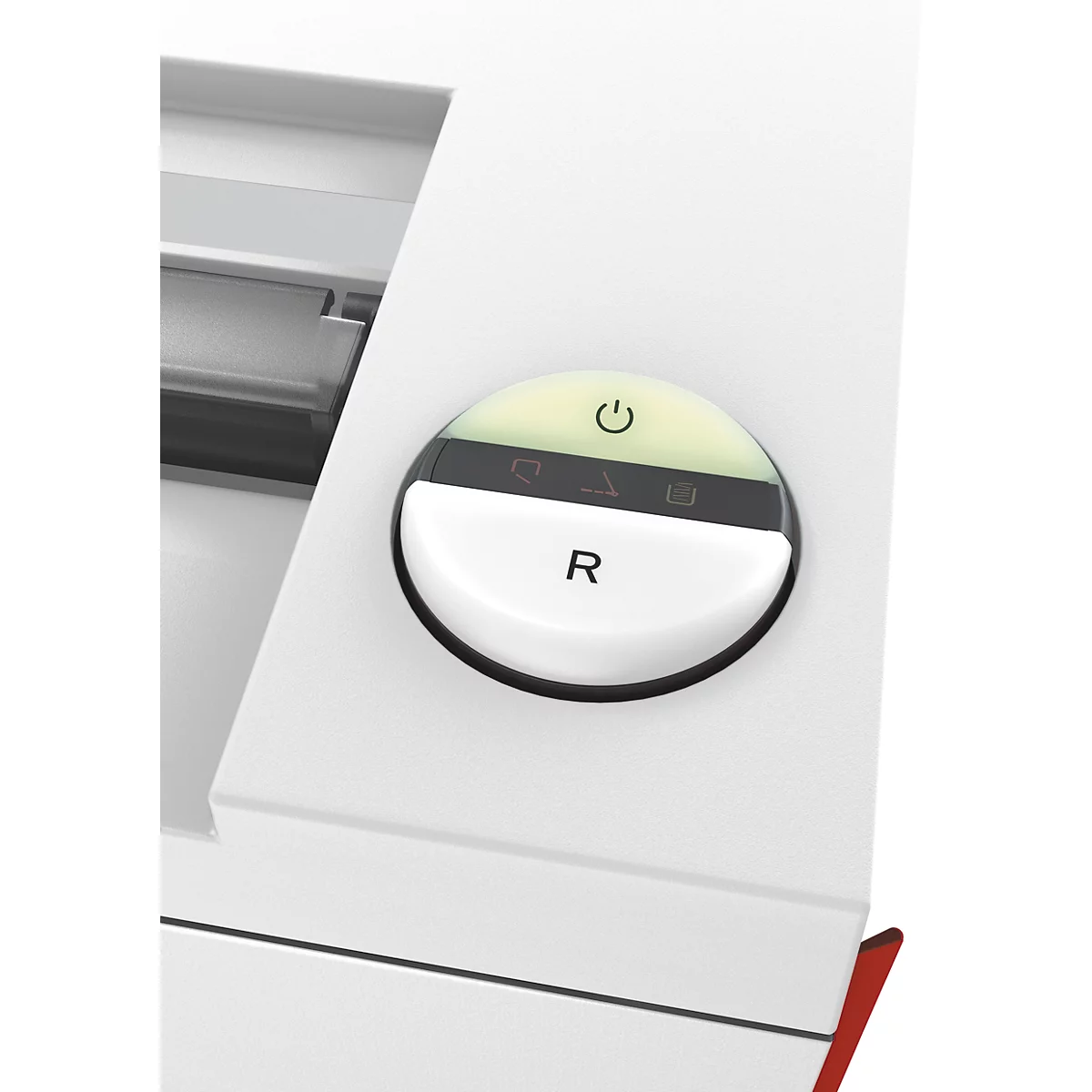 Nahaufnahme eines weißen, runden Knopfes mit grün leuchtenden Symbolen. Unten steht das "R".