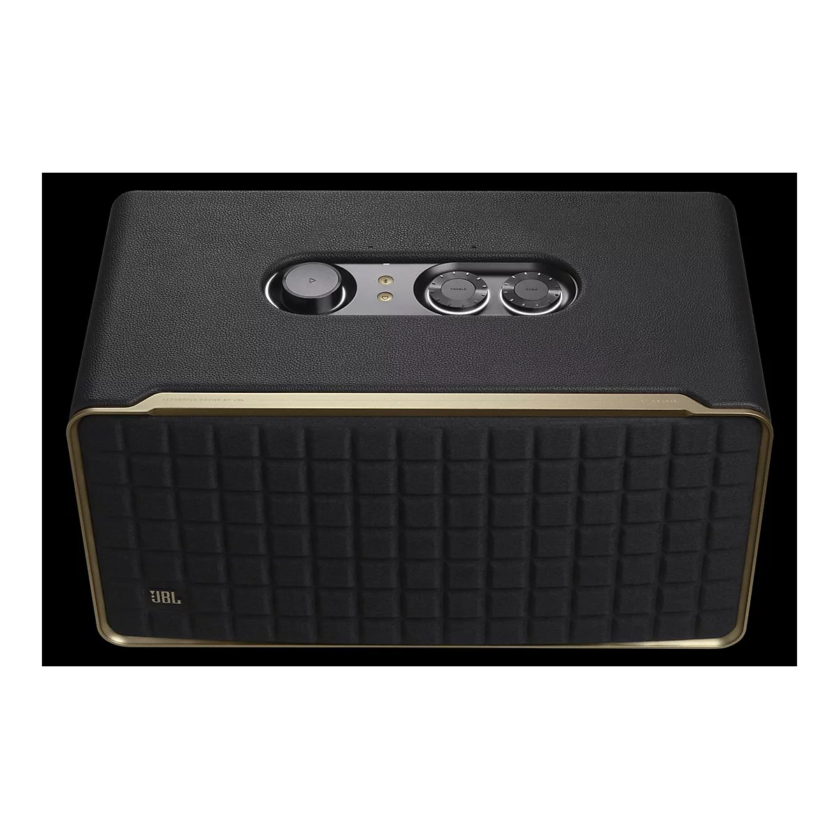 Schwarzer JBL Lautsprecher mit Lederoptik und goldenem Rahmen, bedienbar über Drehregler an der Oberseite.