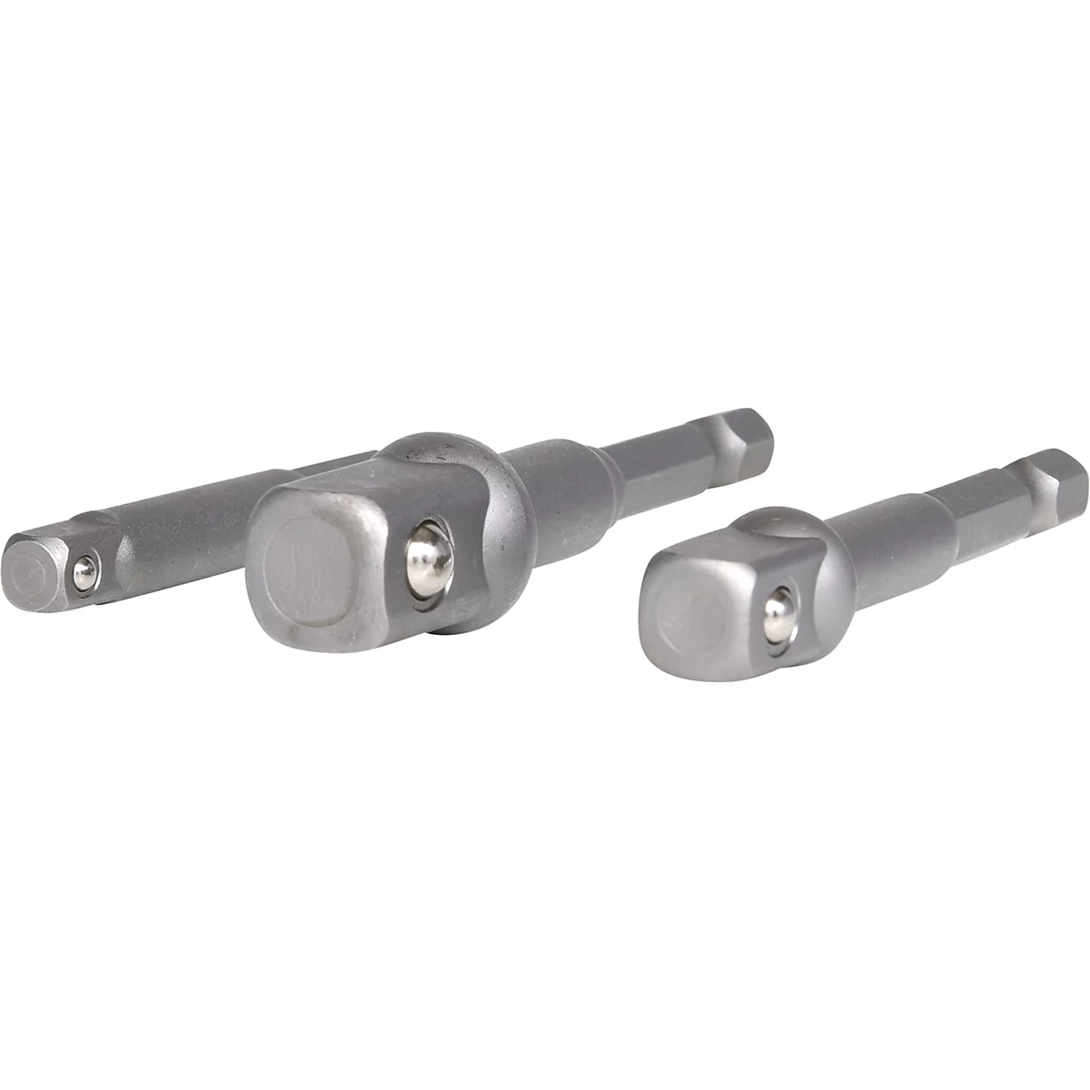 Trois embouts d'outils en métal, de couleur argentée, de formes différentes.