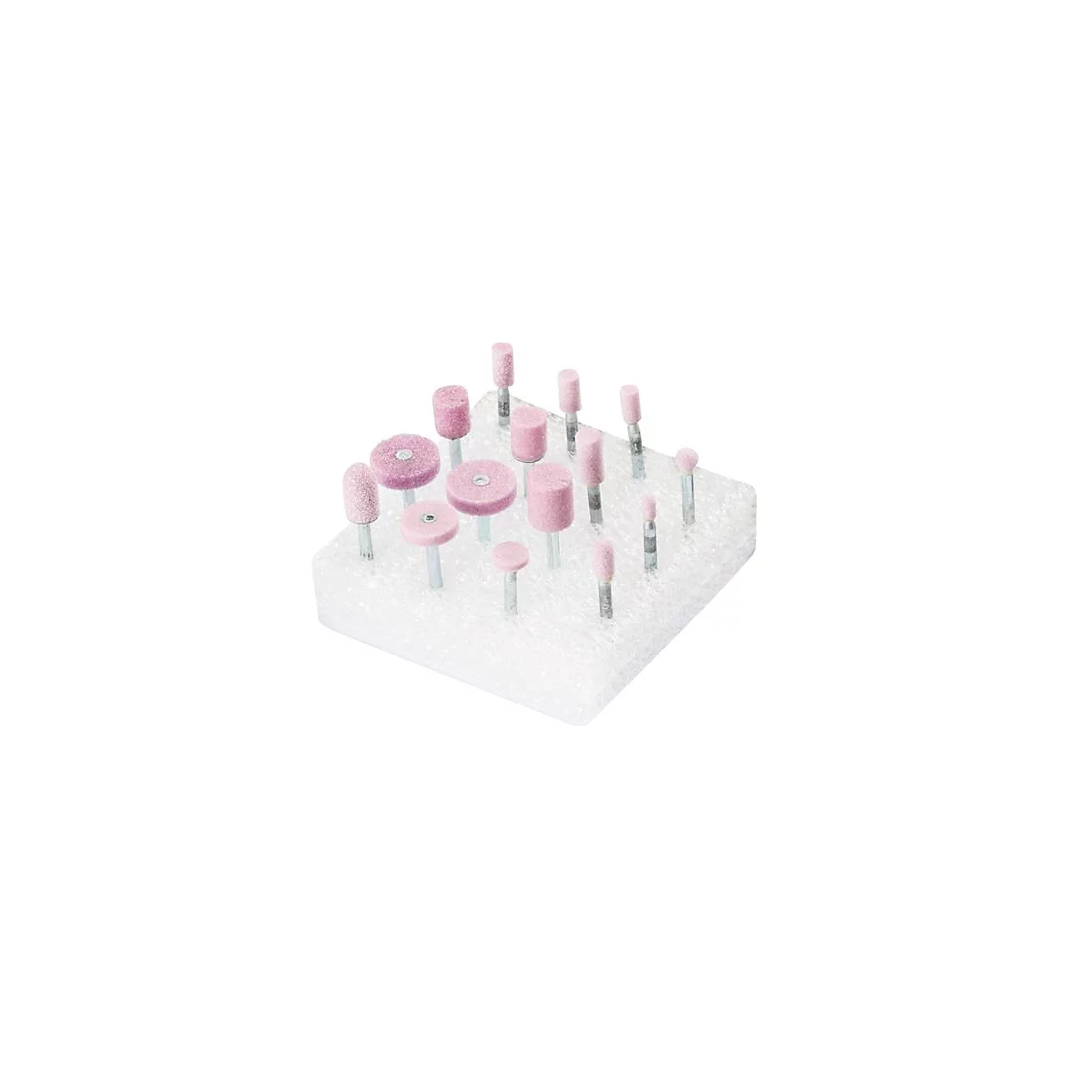 Diverses meules de différentes formes, collées dans une mousse blanche.