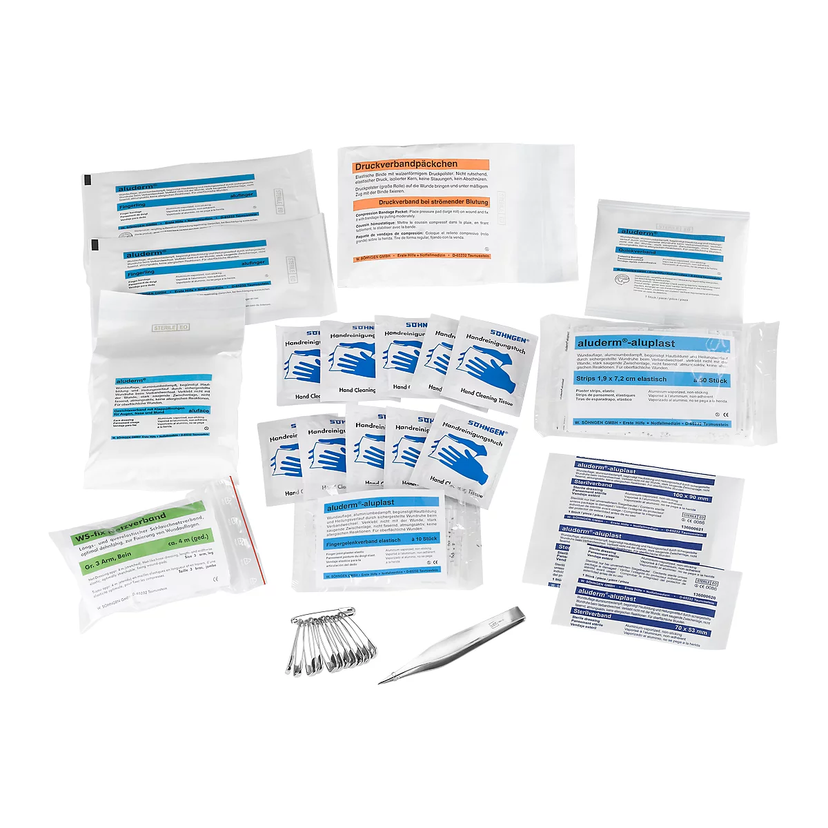 Varios envases médicos, como toallitas con alcohol, toallitas desinfectantes, apósitos para heridas, pinzas y clips.