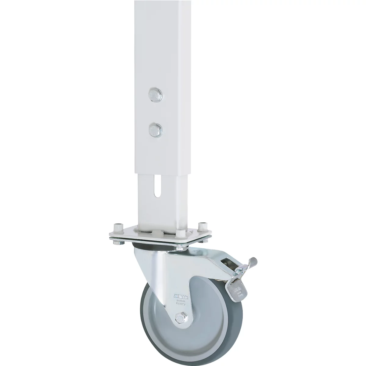 Primer plano de un tubo cuadrado blanco con dos botones, montado sobre una rueda. La rueda es gris.