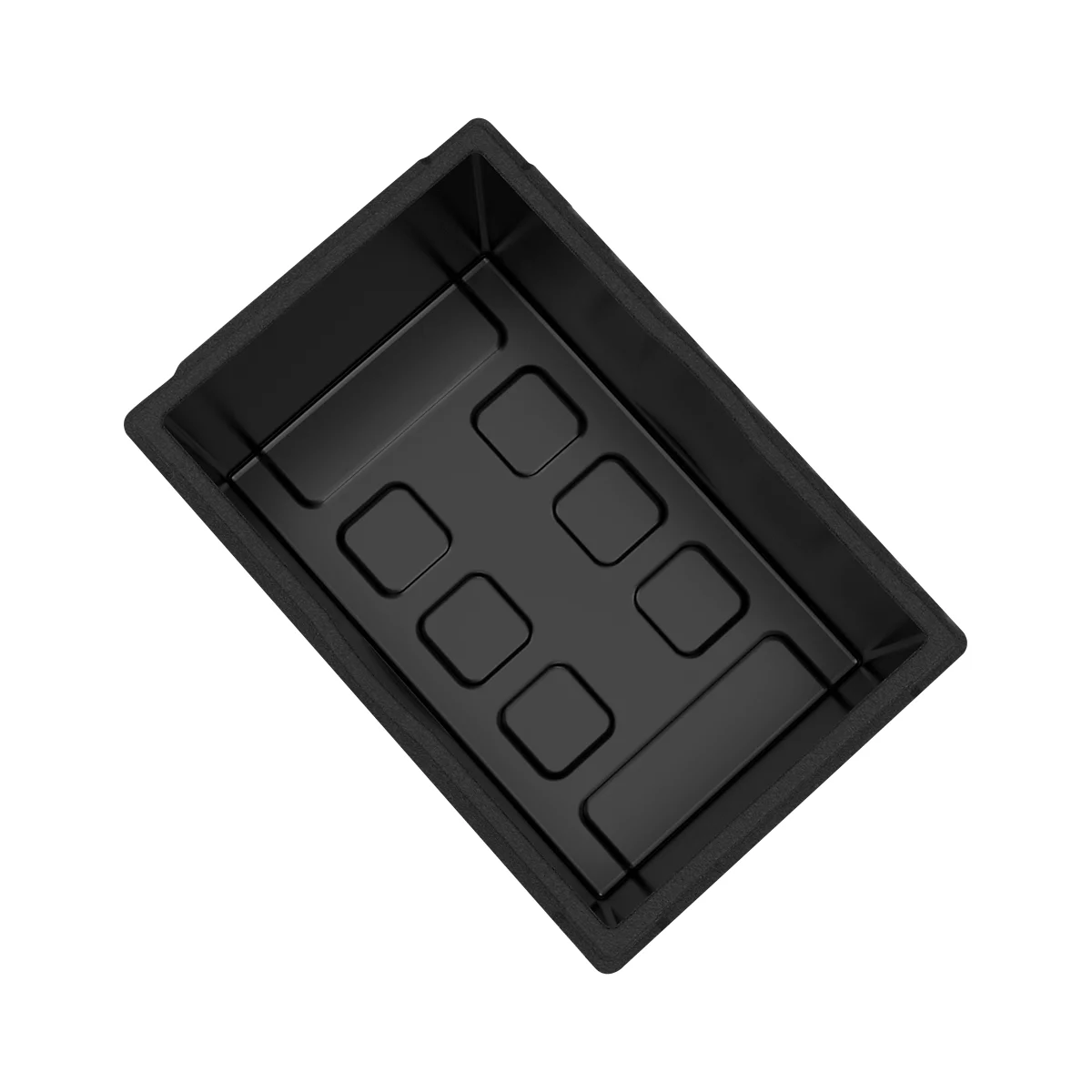 Schwarze, rechteckige Aufbewahrungsbox mit quadratischen Vertiefungen.