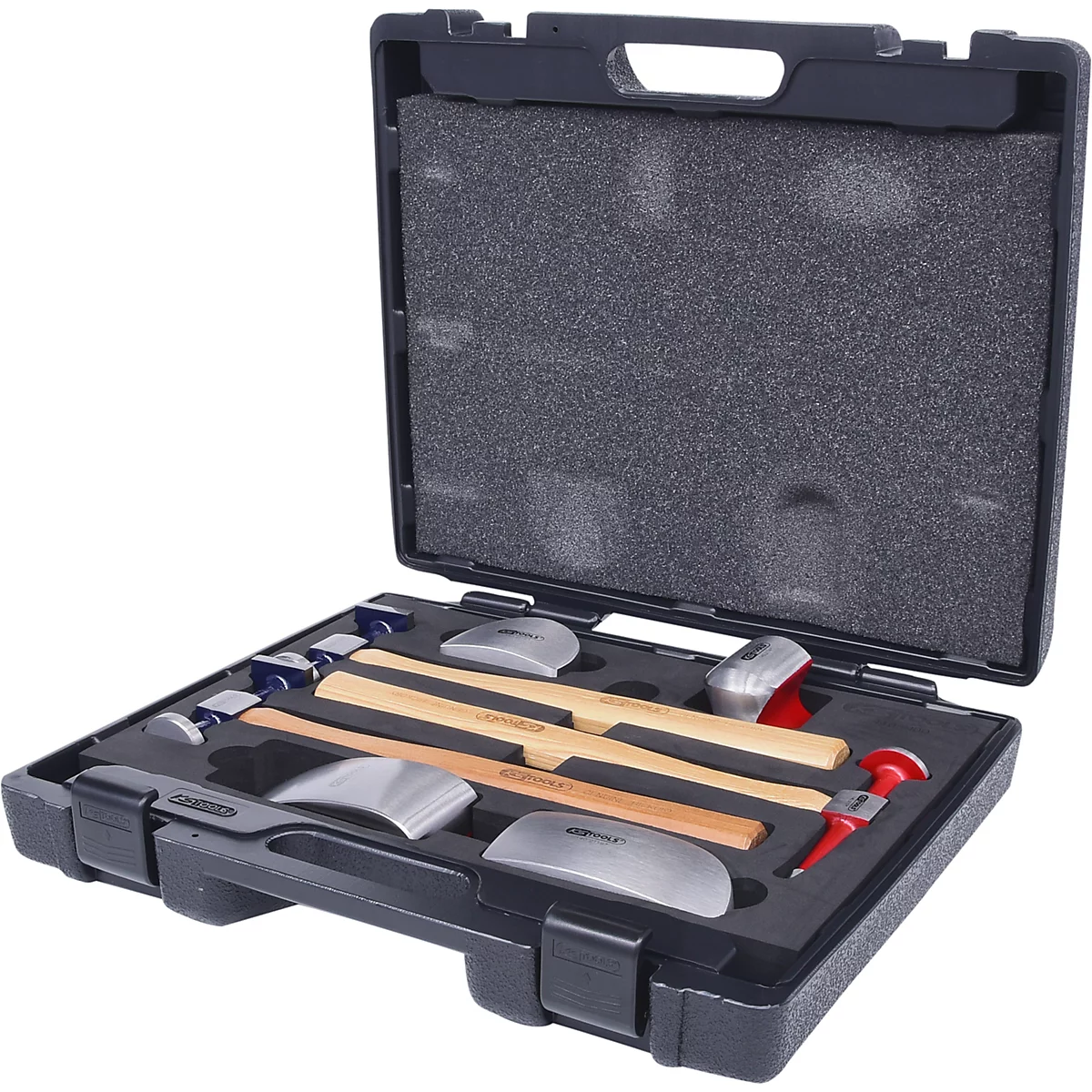 Werkzeugset in schwarzem Koffer: Hämmer, Stempel und Formen. Koffer offen, Werkzeuge angeordnet.