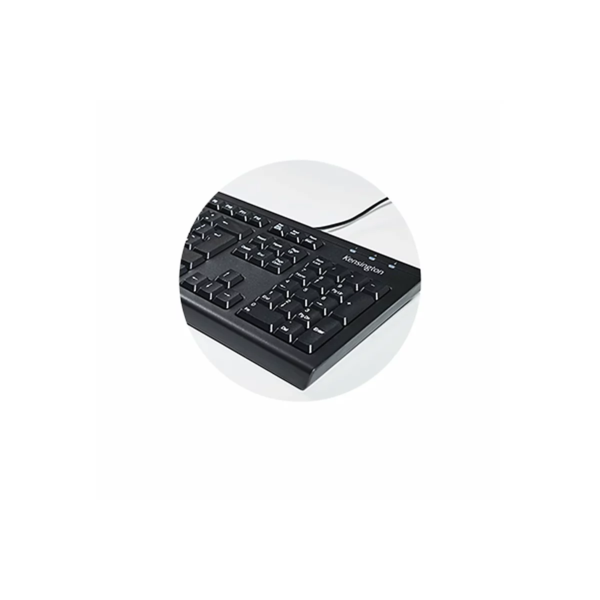 Schwarze Kensington Tastatur, in weißem Kreis vor weißem Hintergrund. Beschriftung: Kensington.