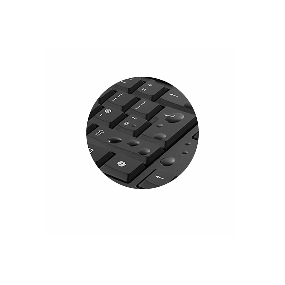 Gros plan sur un clavier noir avec des gouttelettes d'eau. Mise au point sur les touches telles que @, ~, flèche et Entrée.