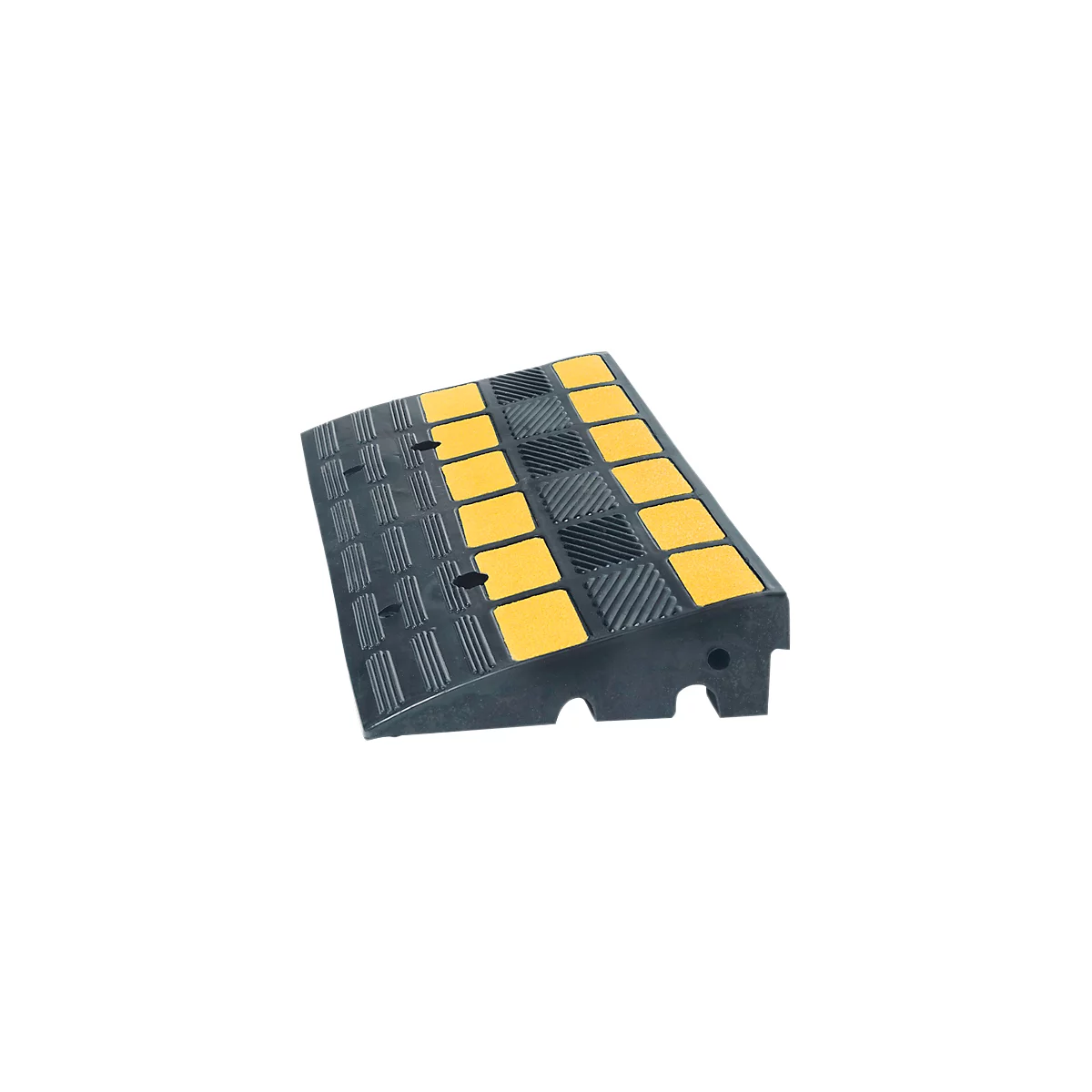 Black rubber ramp with yellow squares and holes for cables. The surface is textured.