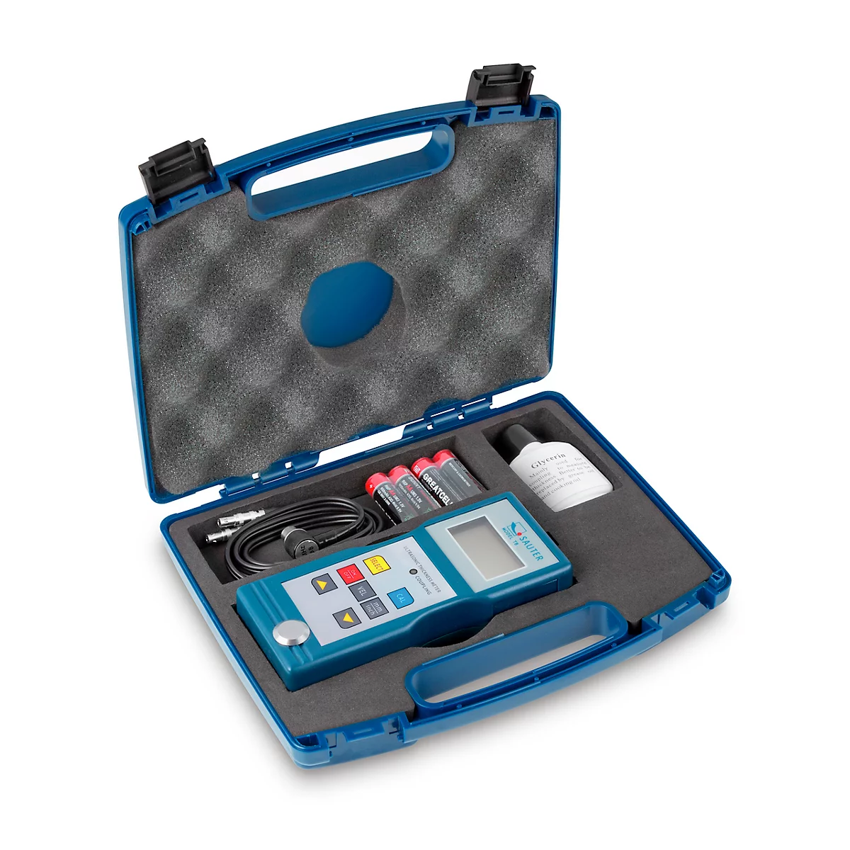 Blauer Koffer mit Messgerät, Batterien, Kabel, und Zubehör. Geöffnet, auf schwarzem Schaumstoff gebettet.