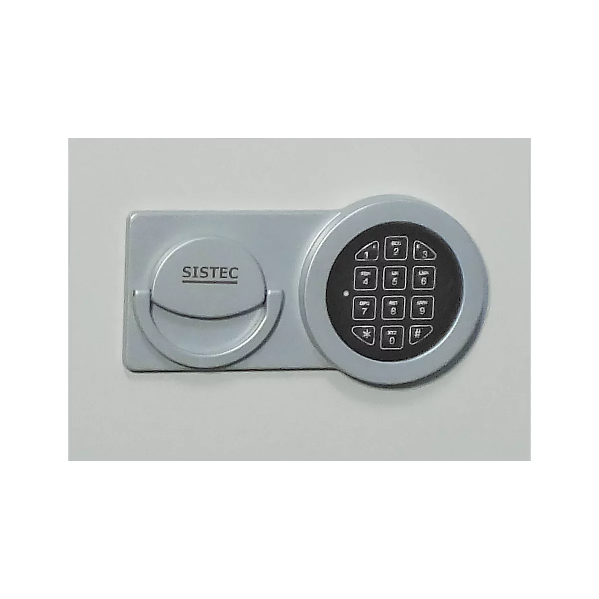 Gray safe door with numeric keypad and handle. "SISTEC" is printed on the handle.