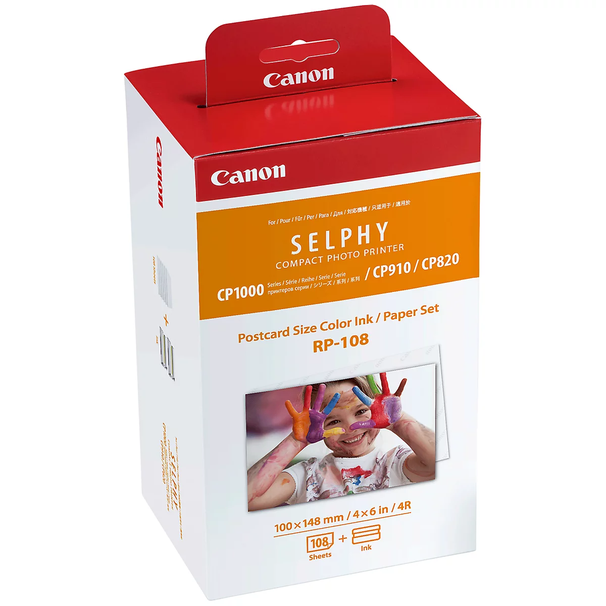 Boîte de cartouches d'imprimante photo Canon Selphy. Impression avec un enfant heureux qui peint les mains.