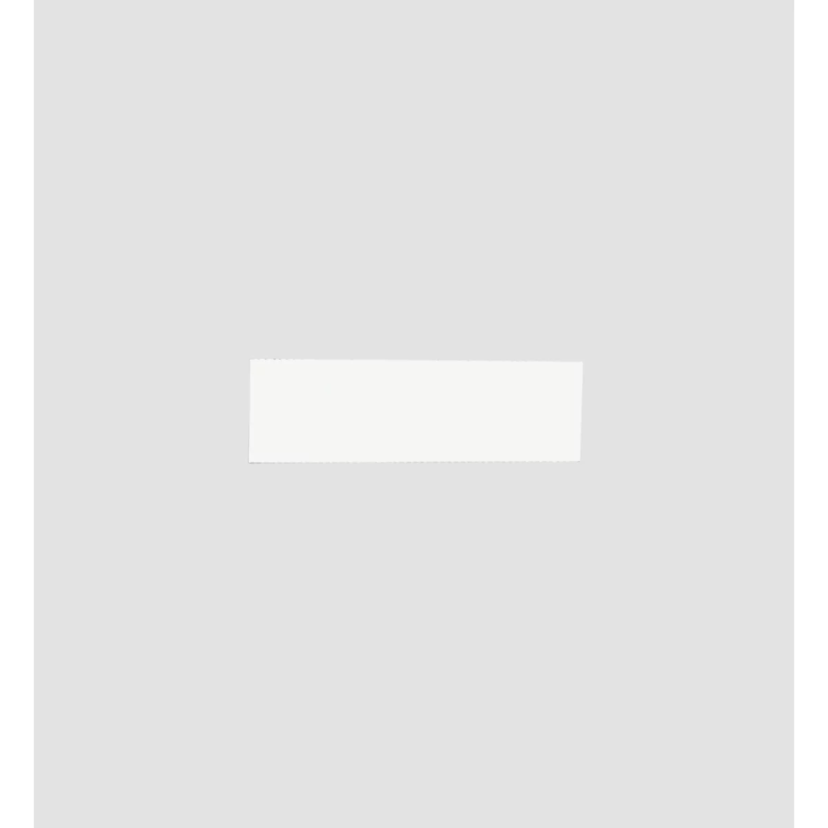 Rechteckiger, cremefarbener Block vor grauem Hintergrund.