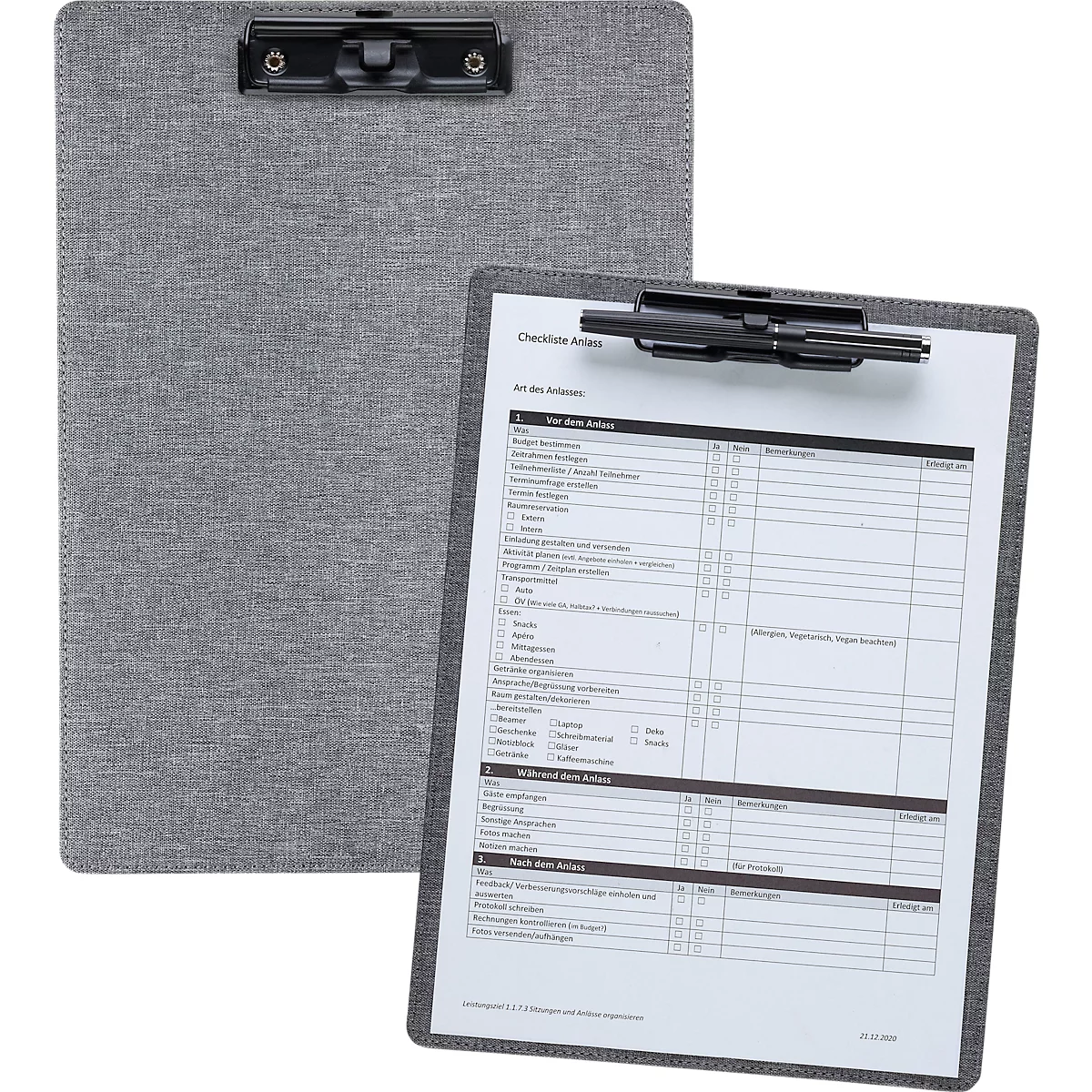 Two gray clipboards; one with paper and text, the other empty.