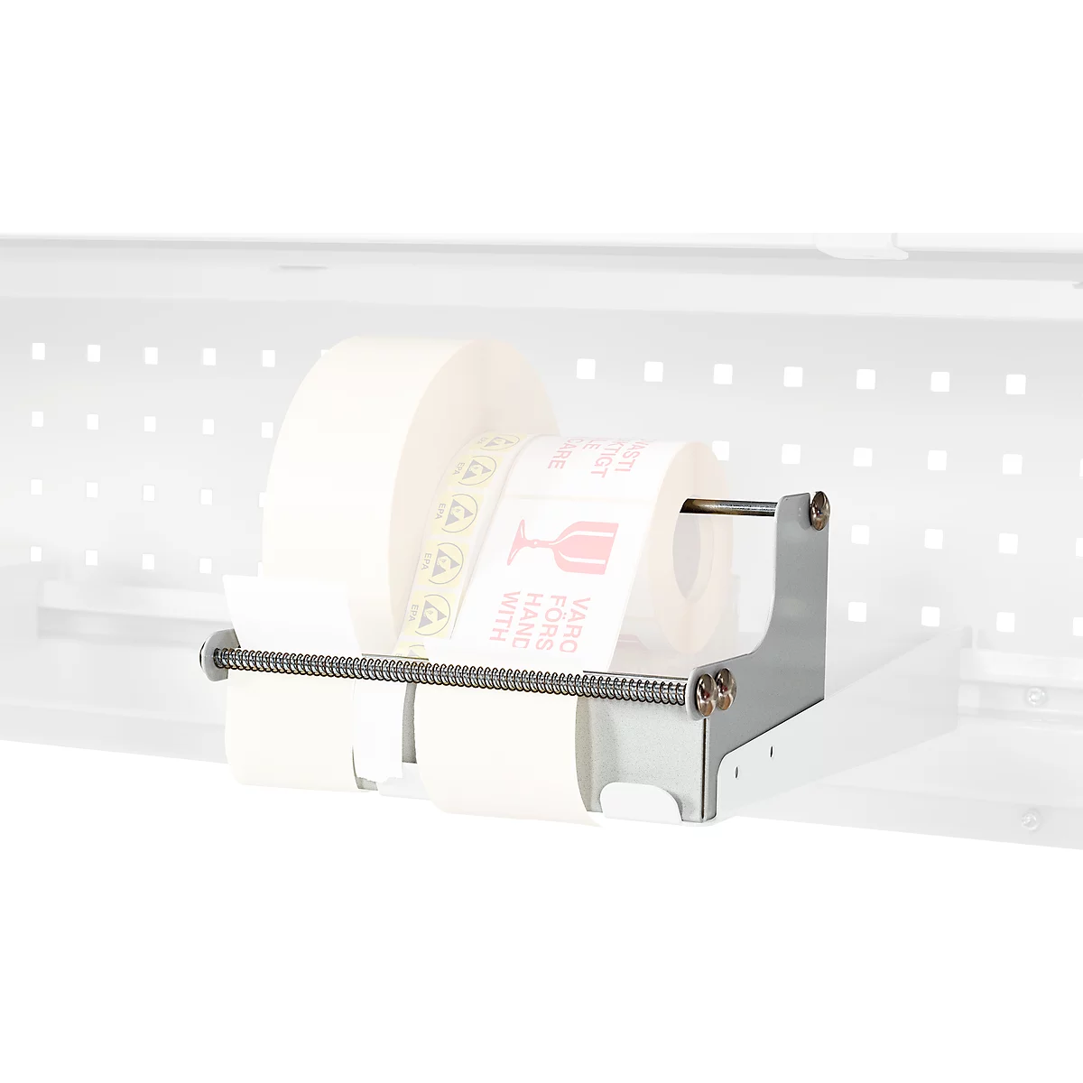 Label roll in a holder. Print: Fragile. Metal holder.