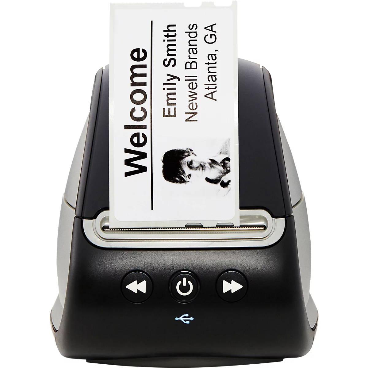 A name tag printer printing a name tag with "Welcome" and name.