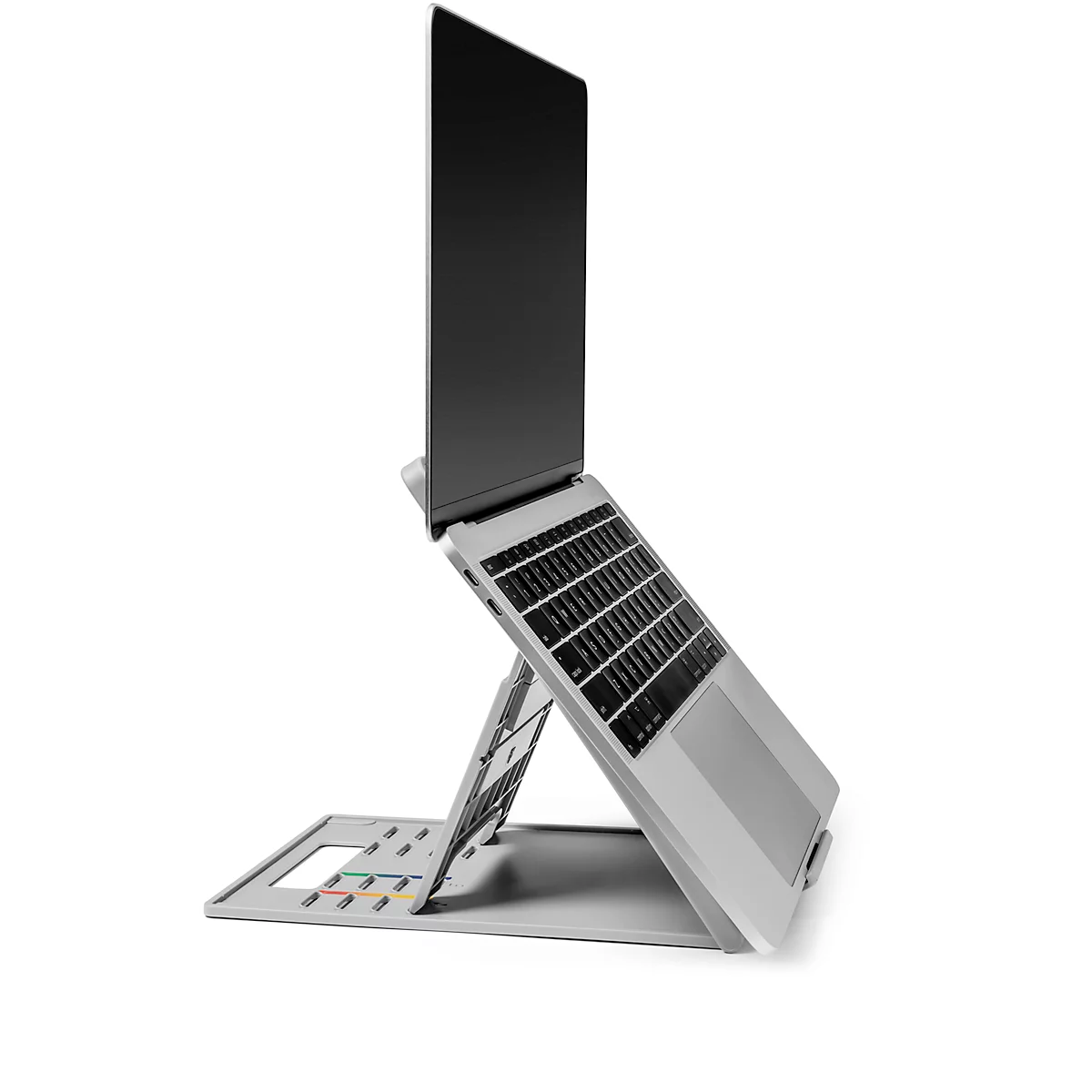 A silver laptop standing on a silver stand, its screen facing upwards.