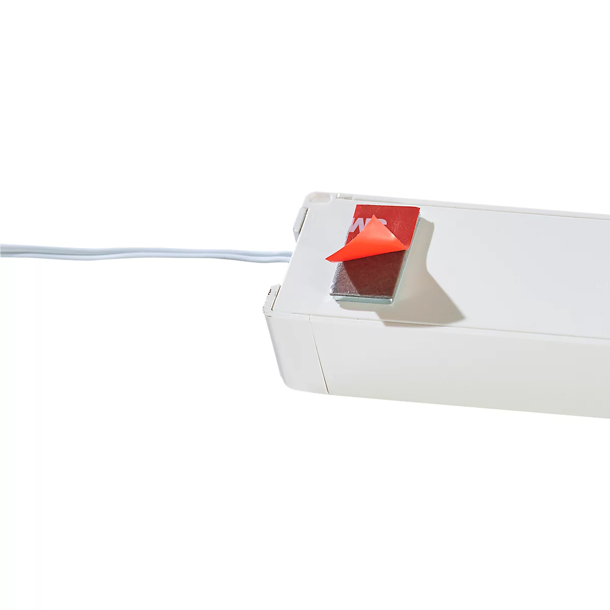 White, elongated housing with a detached, red adhesive strip. A light cable protrudes.