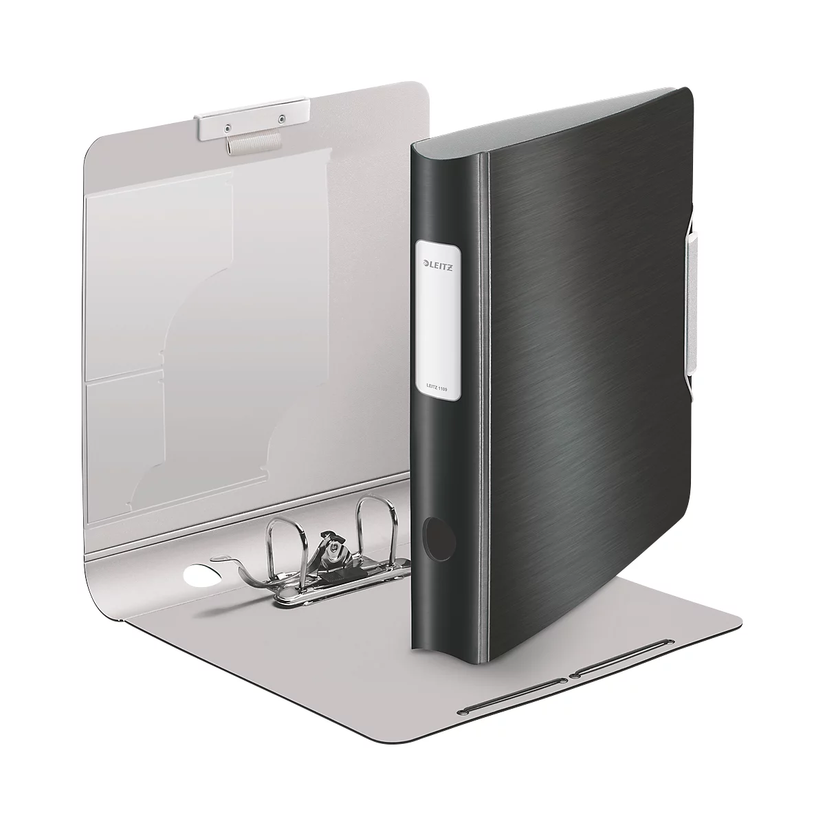 An open black binder stands on a light gray surface. A white label is attached to the side of the binder.