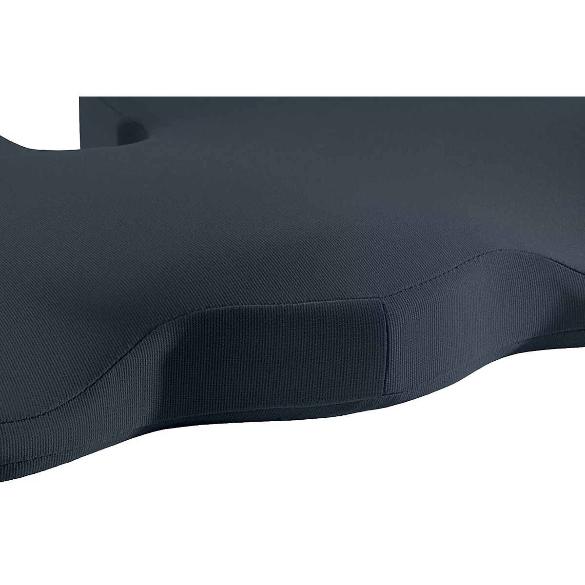 Gros plan sur un coussin de siège bleu foncé avec une texture côtelée et des bords arrondis.