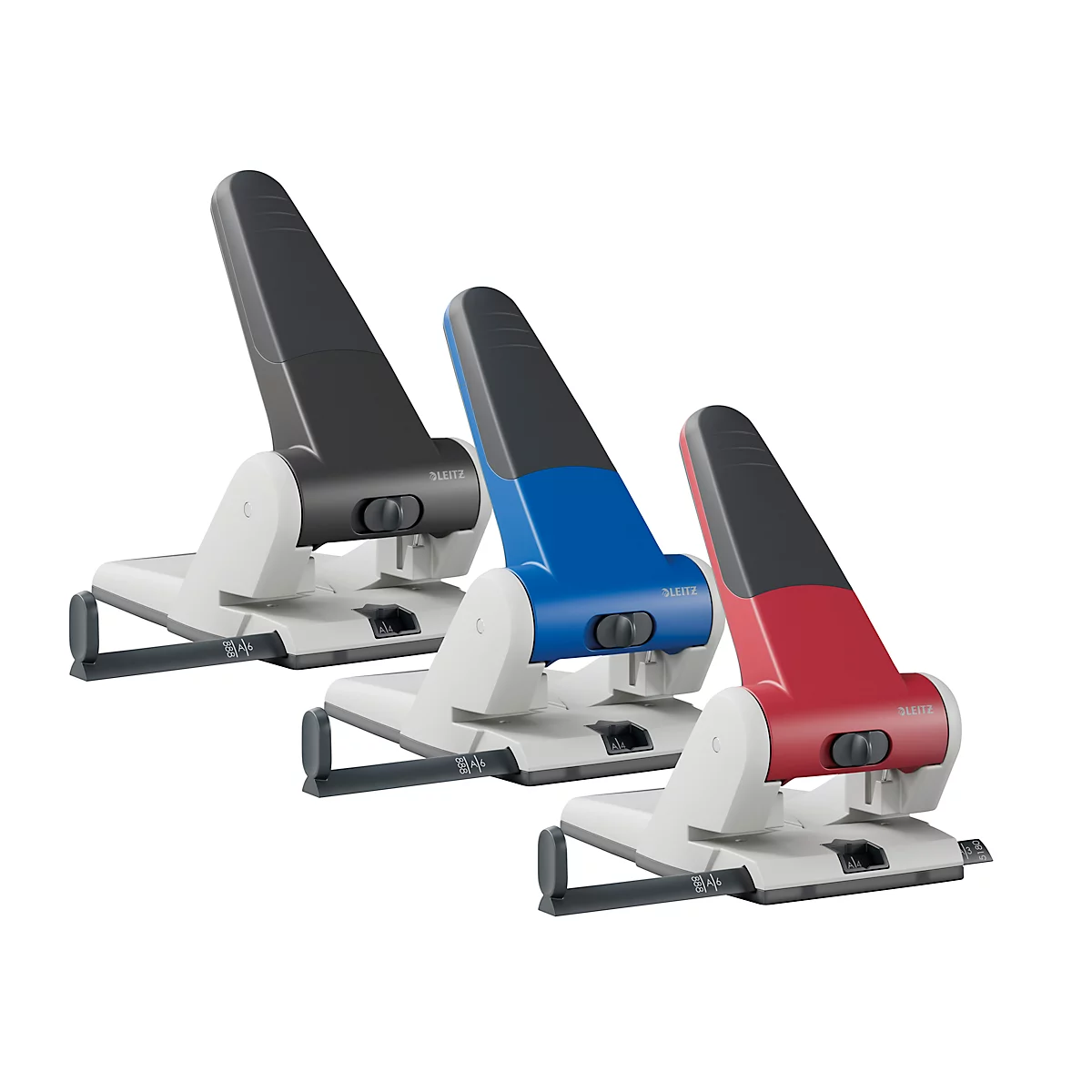 Three hole punches in black, blue, and red next to each other. A lever for punching is visible.