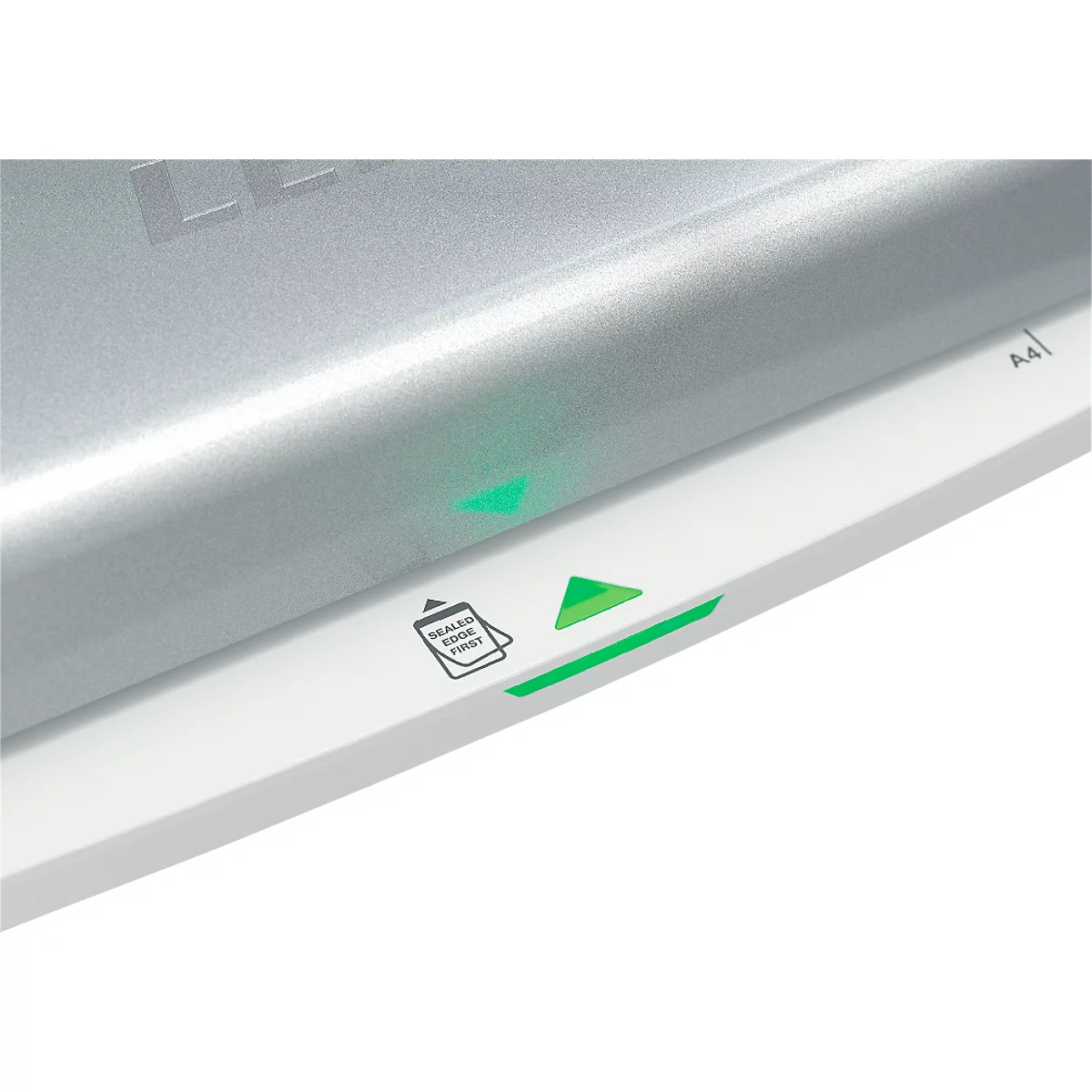 Close-up of a laminator with green indicator lights. On a white surface is a green triangle and a symbol for inserting paper.