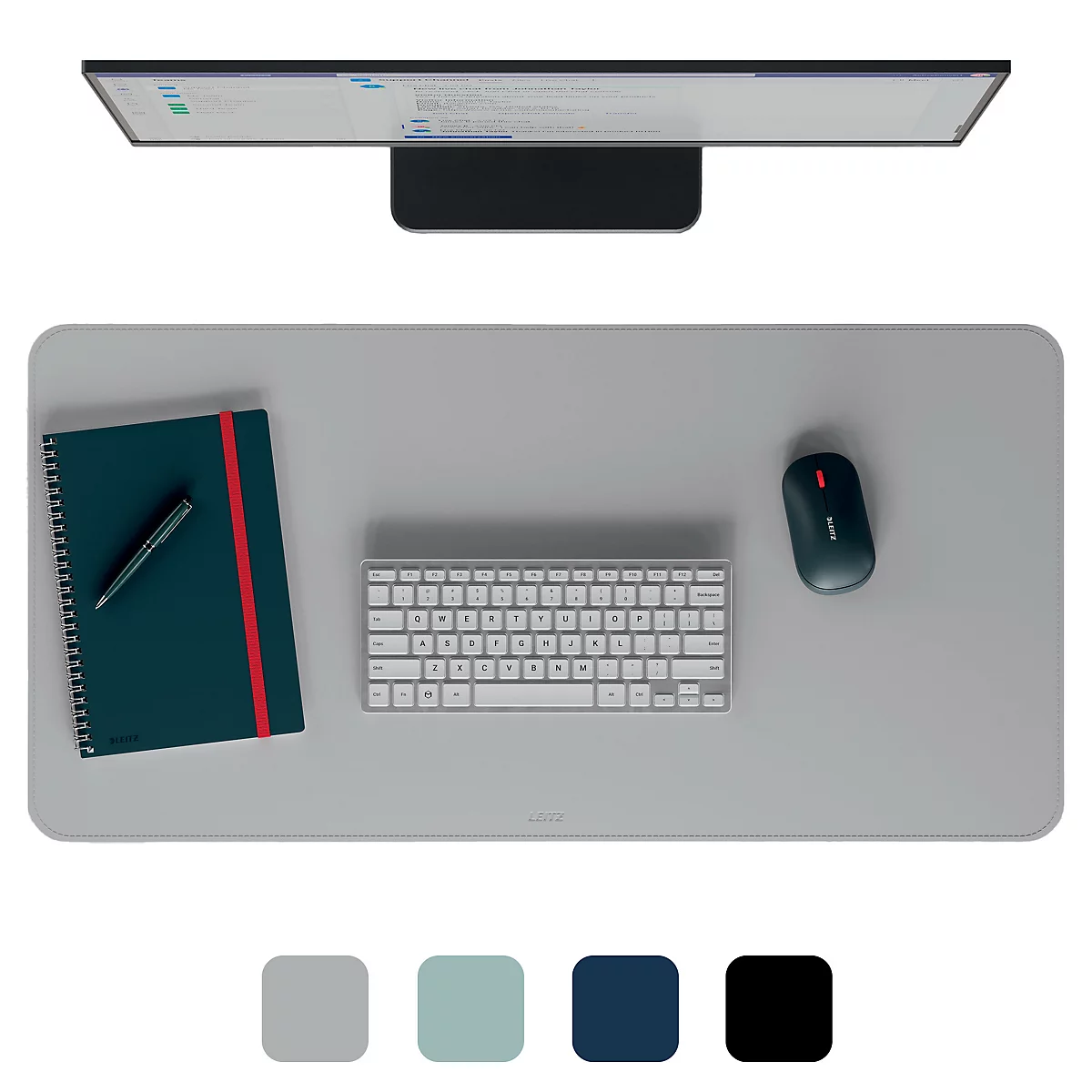 Vue de dessus du bureau avec moniteur, souris, clavier, bloc-notes et stylo. Surface grise avec nuancier en dessous.