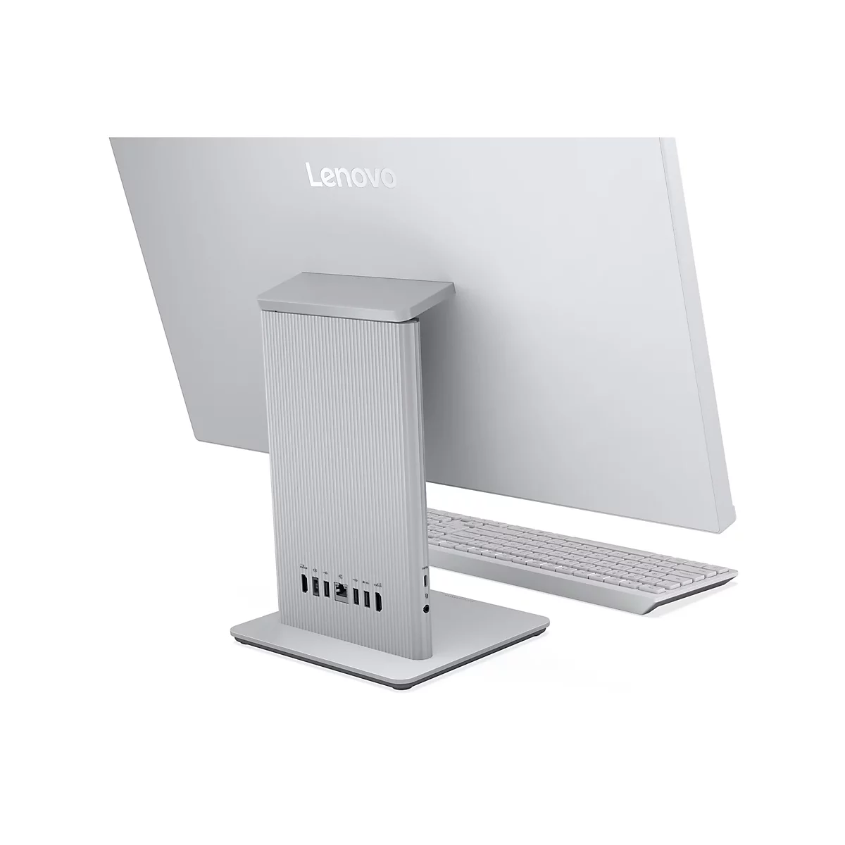 Ein grauer Lenovo All-in-One-Computer von hinten gesehen. Die Tastatur liegt davor. Das Lenovo Logo ist oben auf dem Bildschirm.