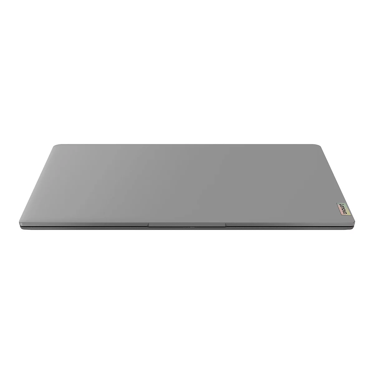 Ein geschlossener, grauer Laptop liegt auf einer weiÃŸen OberflÃ¤che. Auf der Ecke ist ein Lenovo-Logo sichtbar.