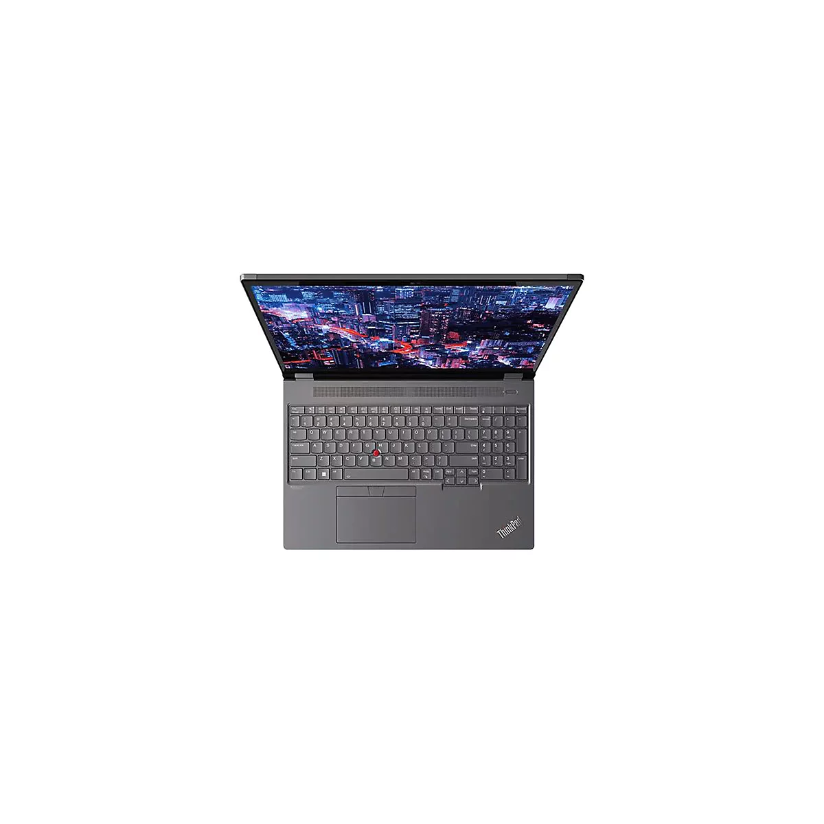 Draufsicht auf einen geÃ¶ffneten grauen Laptop. Der Bildschirm zeigt eine Stadt bei Nacht. Unterhalb die Tastatur mit rotem Trackpoint.