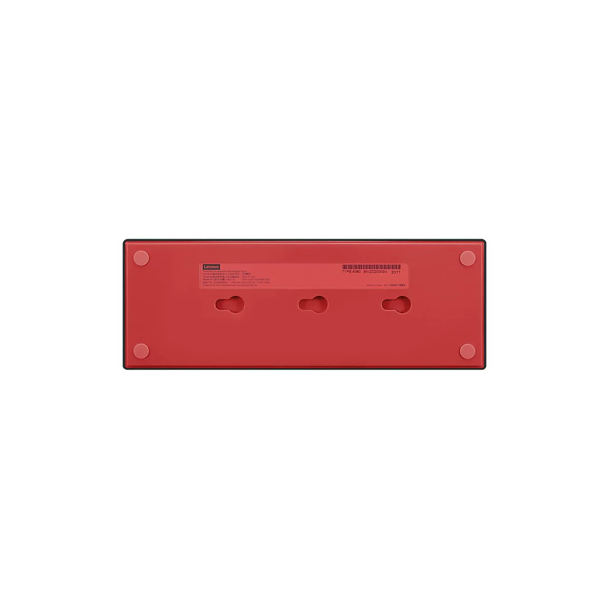 Face infÃ©rieure rouge d'un appareil Lenovo. Trous et Ã©tiquettes visibles.