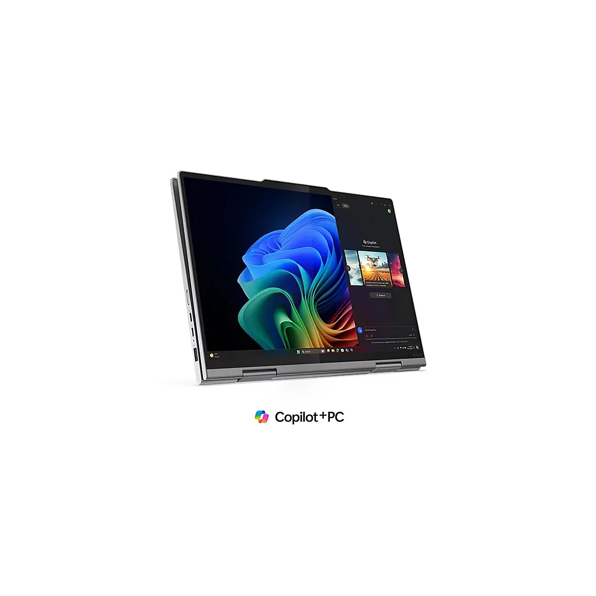 Silbernes Laptop-Tablet im Winkel, Bildschirm zeigt eine App mit bunten Grafiken. Unten rechts Logo "Copilot+PC".