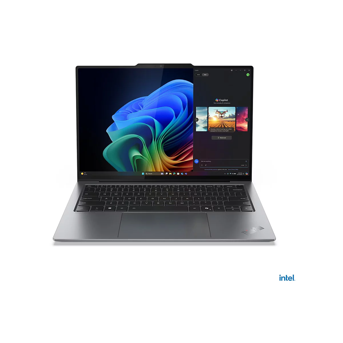 Grauer Laptop mit offenem Display, das eine farbenfrohe Grafik und eine App-OberflÃ¤che zeigt. Auf weiÃŸem Hintergrund. Intels Logo.