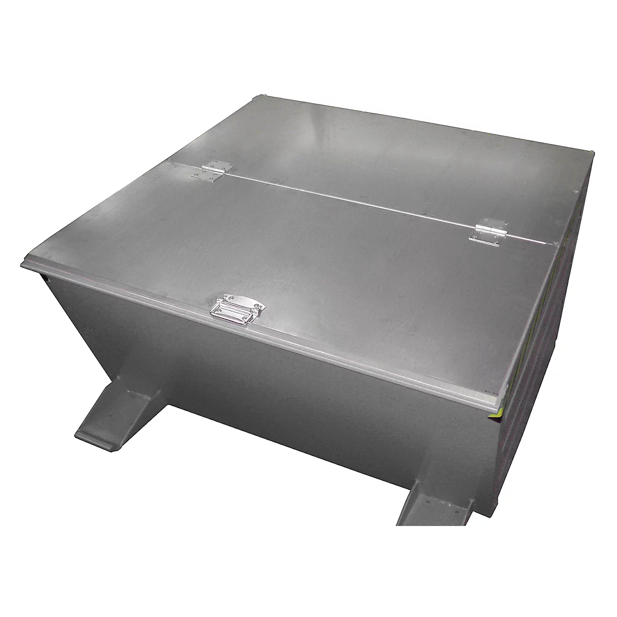 A rectangular metal box with a lid, latches, and legs.