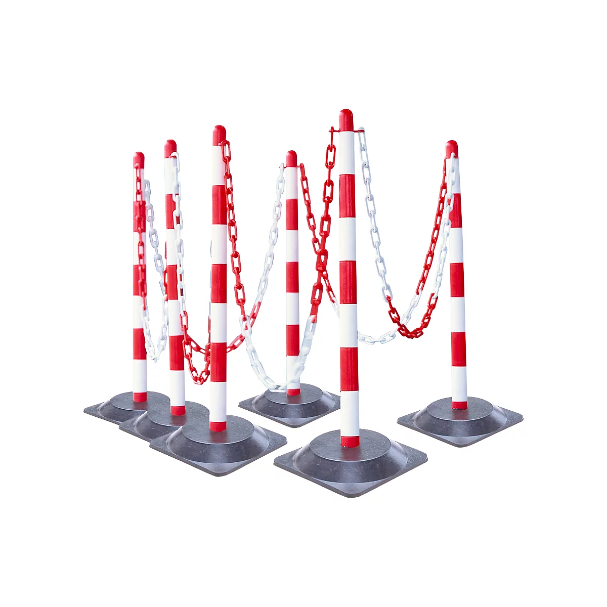 Red and white striped barrier posts with chains, on a grey surface.