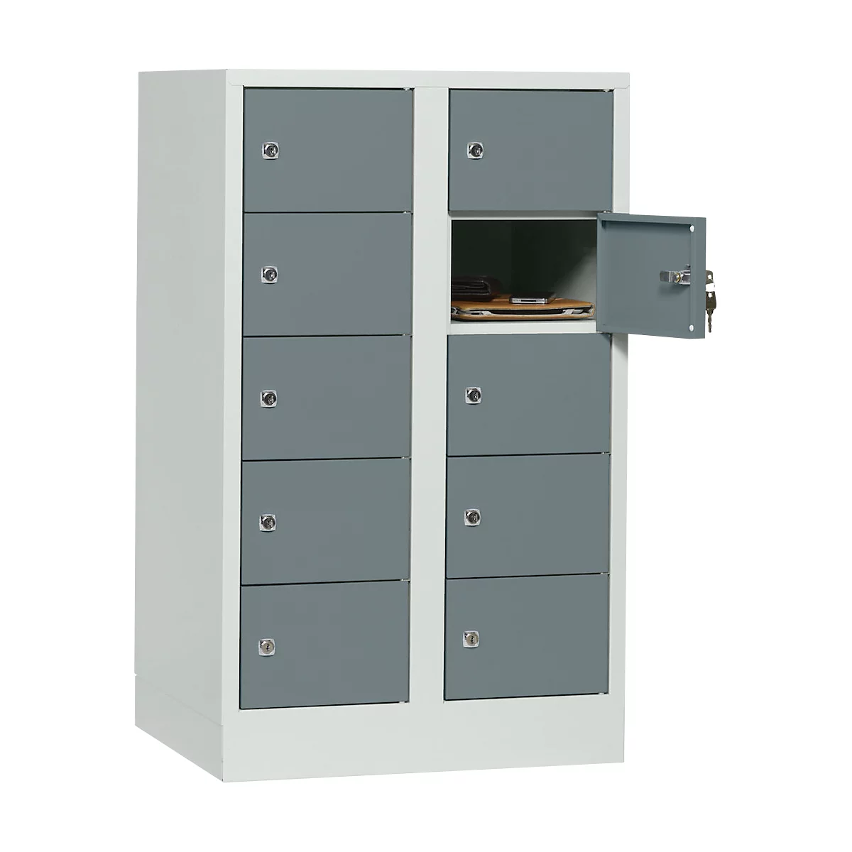 Gray cabinet with multiple compartments, one compartment open, keys in lock.