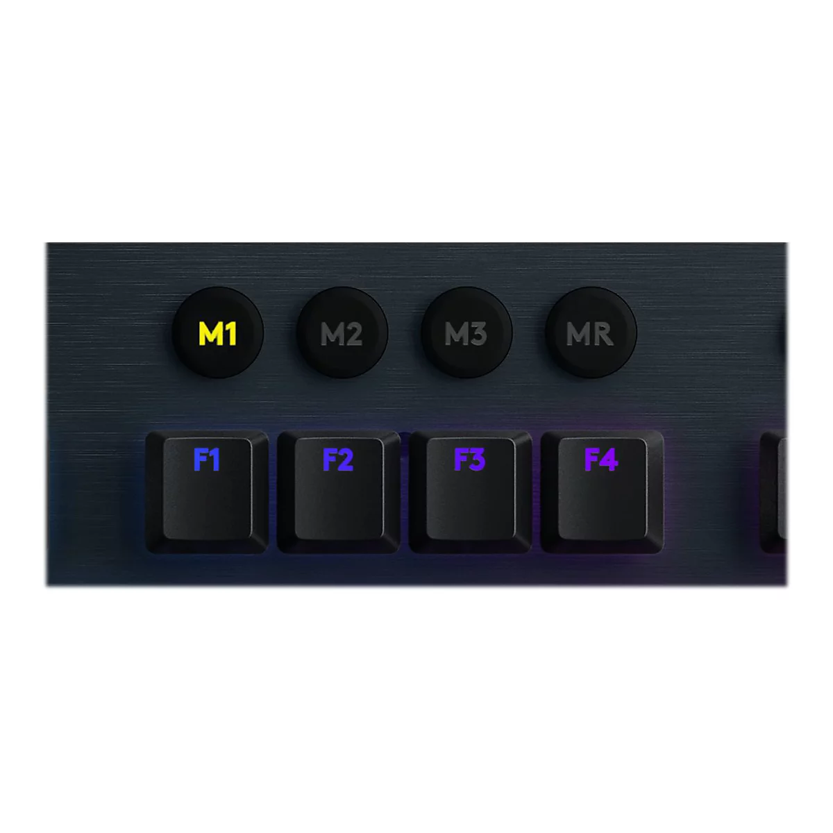 Nahaufnahme einer Tastatur mit beleuchteten Tasten. Die Tasten sind mit M1, M2, M3, MR und F1, F2, F3, F4 beschriftet.