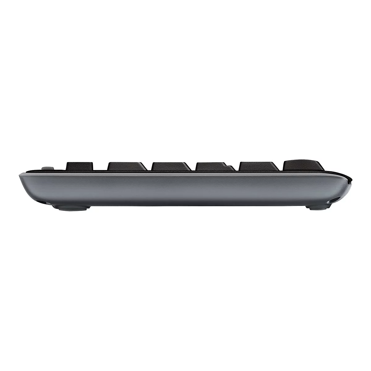 Graues Keyboard von der Seite, dunkle Tasten, helle Oberfläche.