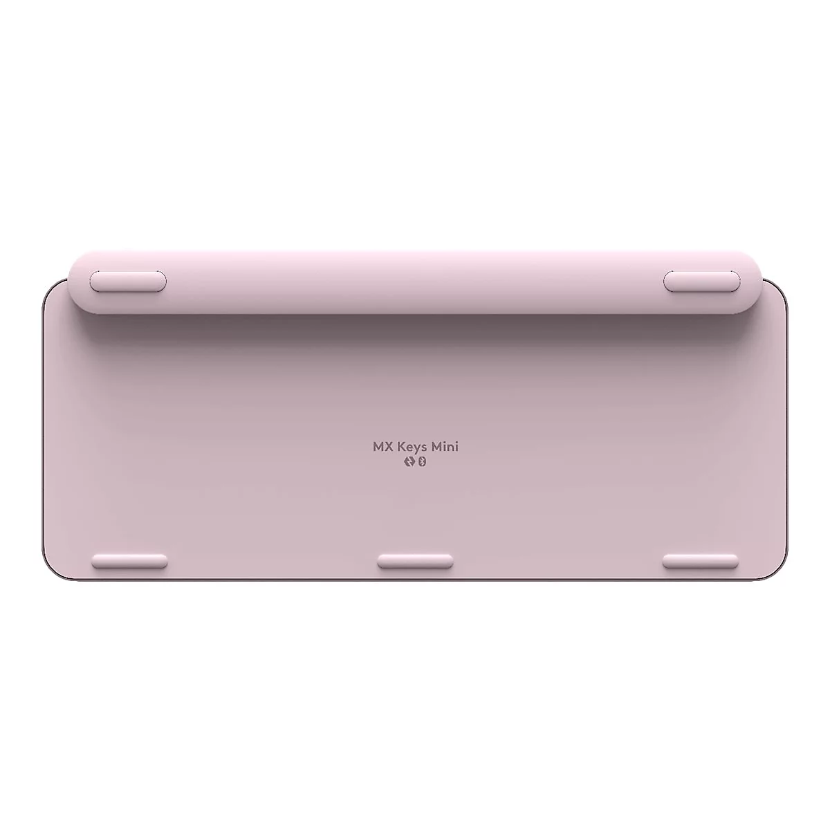 Draufsicht auf eine rosa Tastatur. Auf der Oberfläche steht „MX Keys Mini“.