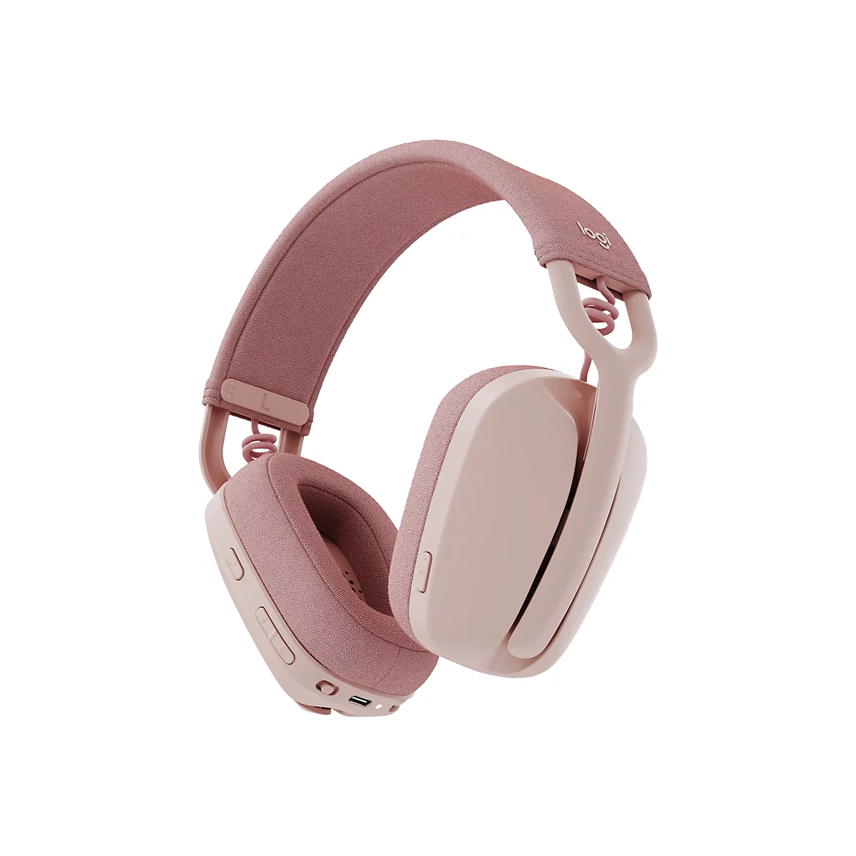 Casque sans fil rose clair, le logo Logitech sur le bandeau. Les écouteurs sont recouverts de tissu.