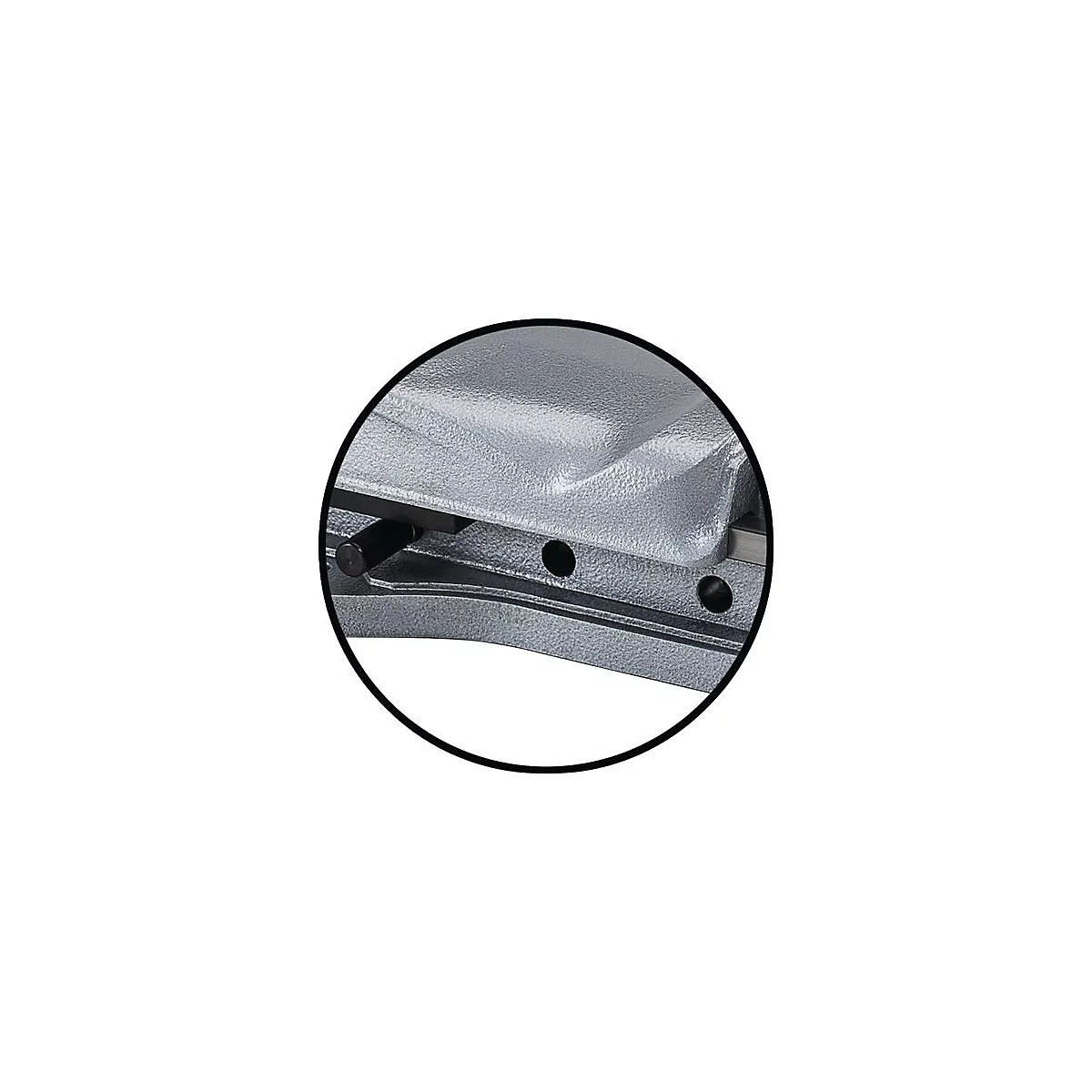 Close-up van een zilveren perforator. Een zwarte hendel bevindt zich aan de linkerkant.