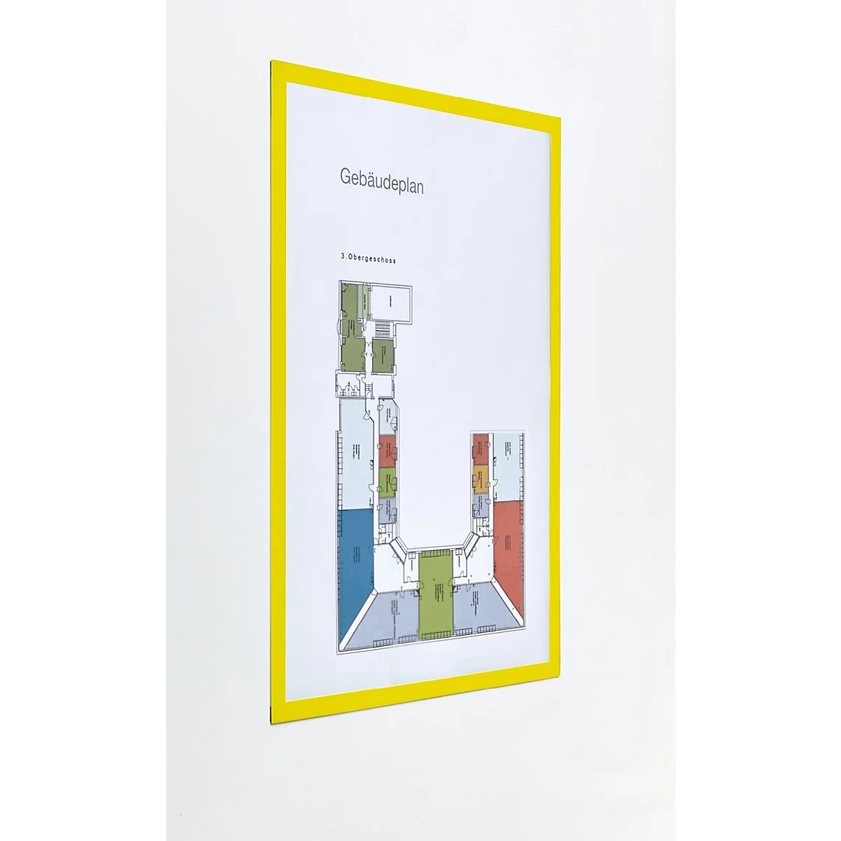Gelber Magnetrahmen an weißer Wand mit Gebäudeplan, rechts Text zu Anwendung in Büro und Lager.