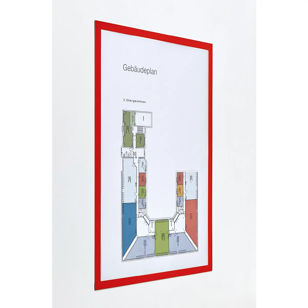 Magnetoplan Infotafel mit rotem Rahmen an einer Wand, daneben Werbetext zur Anwendung in Büros und Lagern.