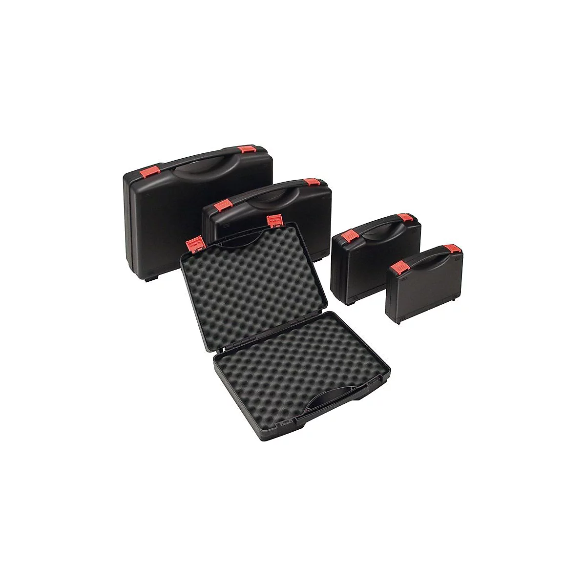 Valises de transport noires de différentes tailles, une valise est ouverte avec un insert en mousse.