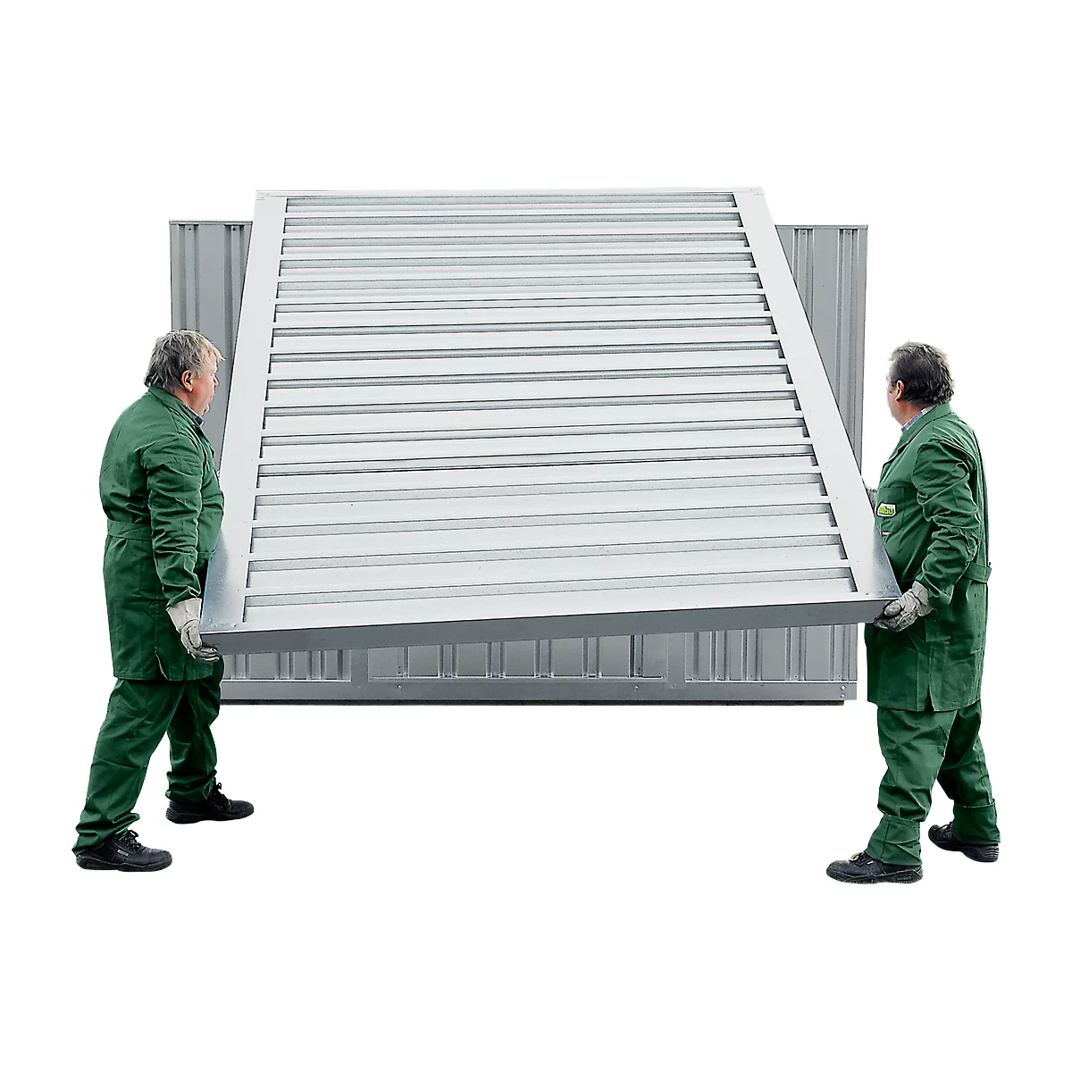 Two men carrying a metal grid in a container. They are wearing green overalls and gloves.