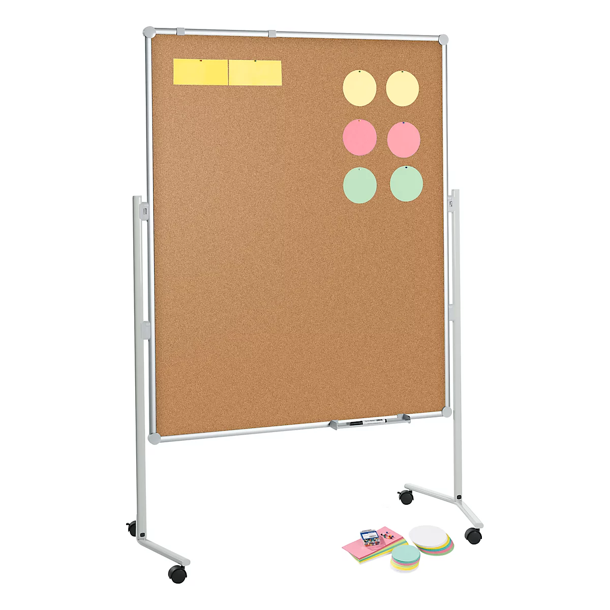 A rolling corkboard system with sticky notes. Note blocks and chalk are on the floor.