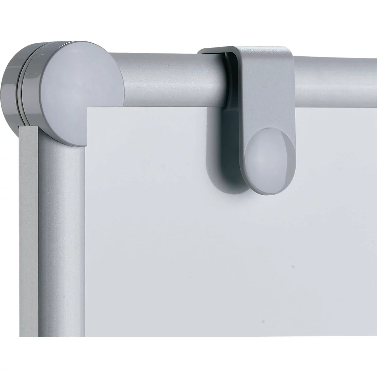 Gray clip element holding a white sheet of paper on a metallic, silver frame.