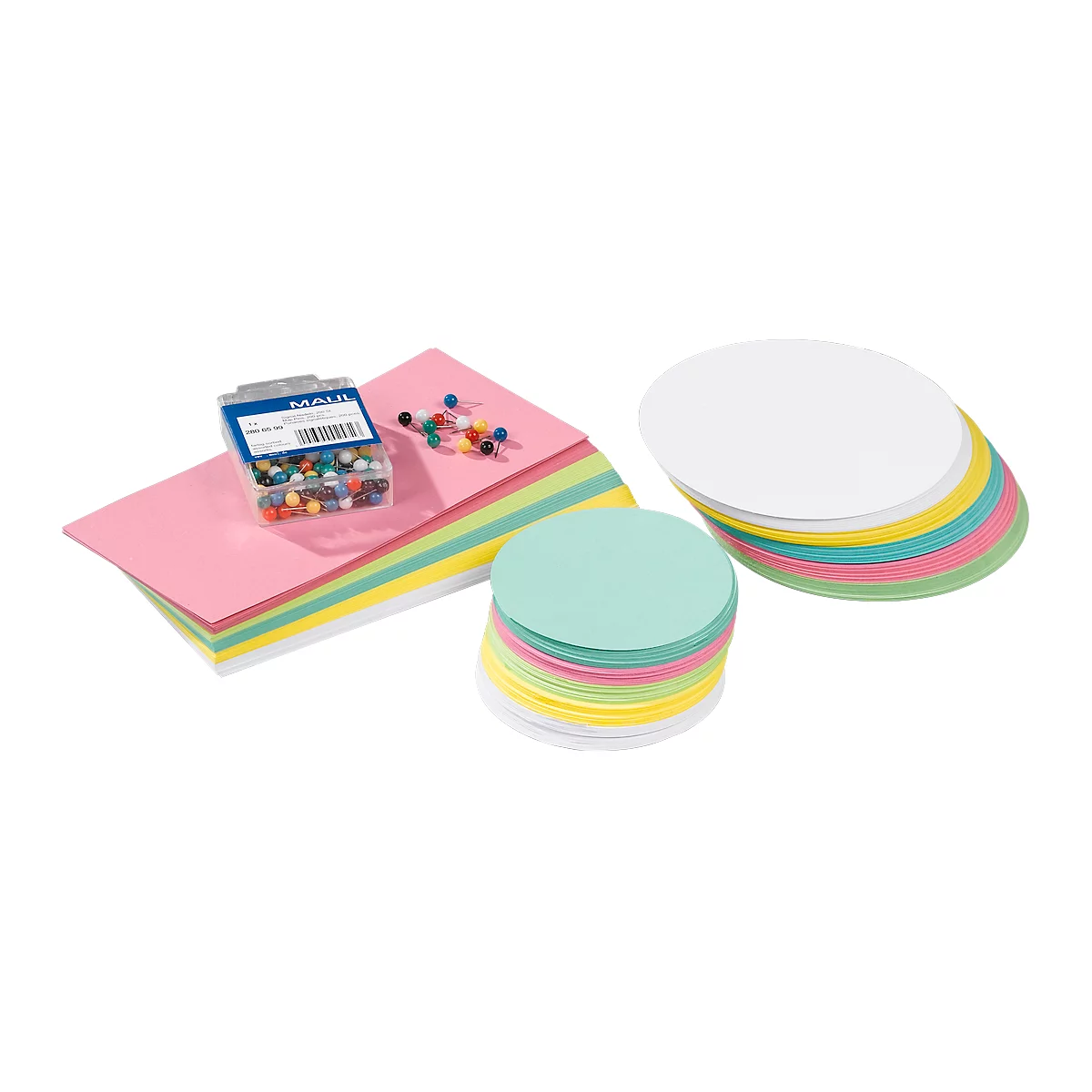 Colorful stacks of paper and round cards next to push pins and a box with small balls.