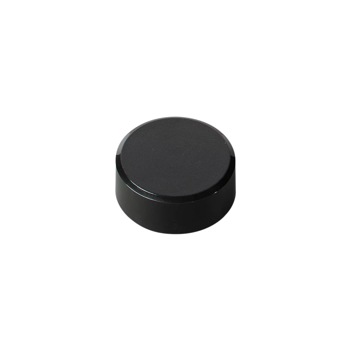 Round, black button. Slightly textured on top, with a glossy edge.