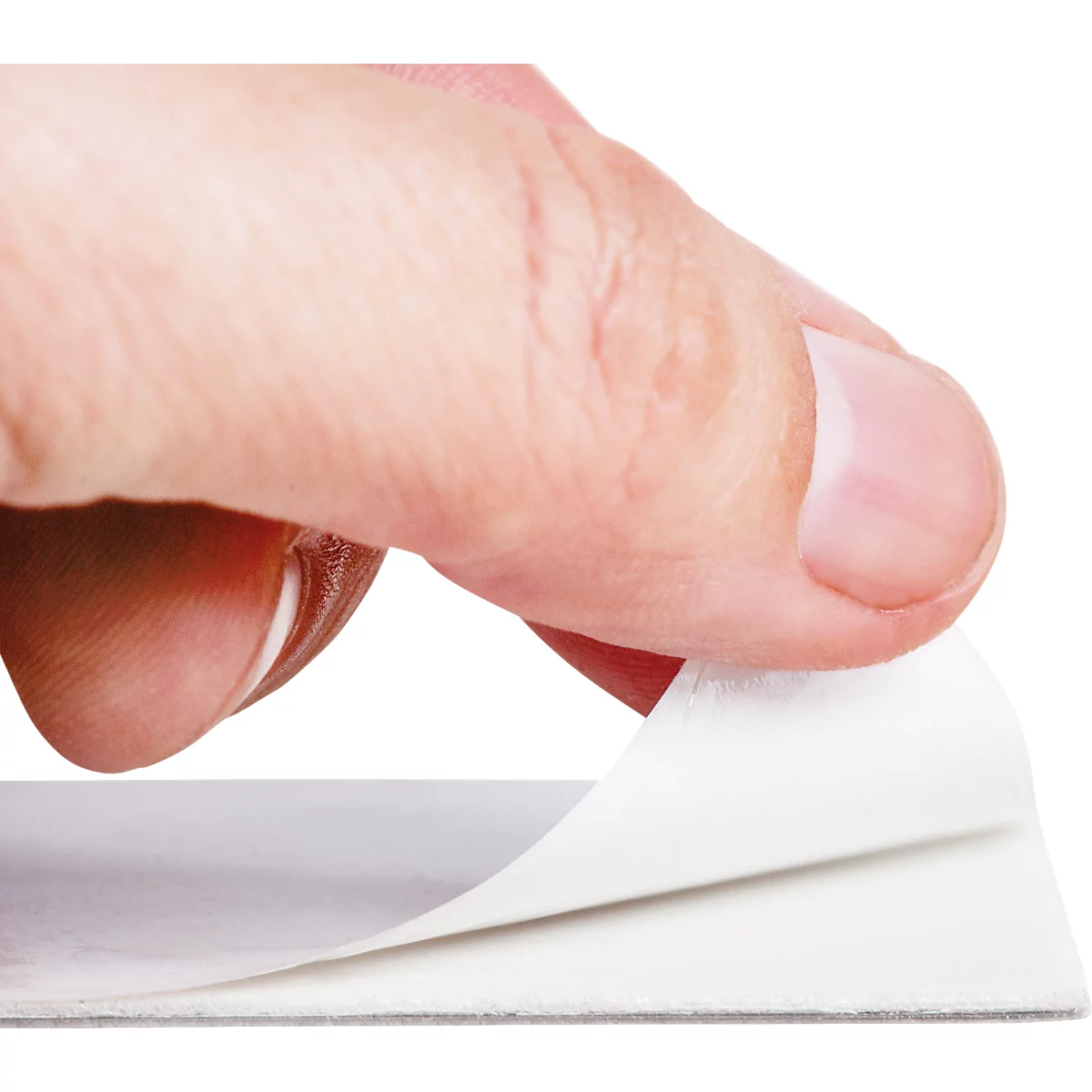 A hand peeling off a piece of white paper, in the foreground. The background is white.