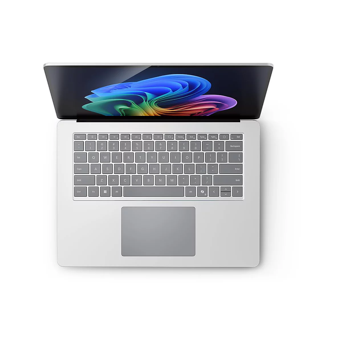 Draufsicht auf einen silbernen Laptop mit geÃ¶ffnetem Bildschirm, auf dem ein buntes Wirbelmuster zu sehen ist.