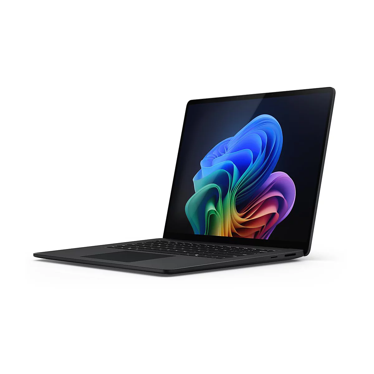 Dunkelgraues Laptop, leicht geÃ¶ffnet. Auf dem Bildschirm ein farbenfrohes, abstraktes Muster.